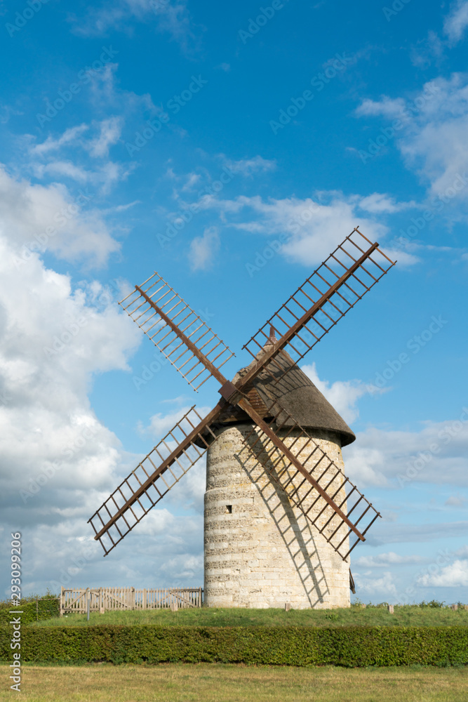 vertical view of the historic windmill Moulin de Pierre in Hauville in Normandy