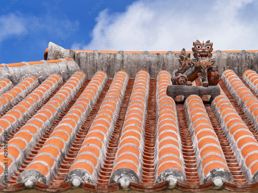 Fototapeta Okinawa Lion on Ryukyu architecture Roof Art Okinawa island Japan