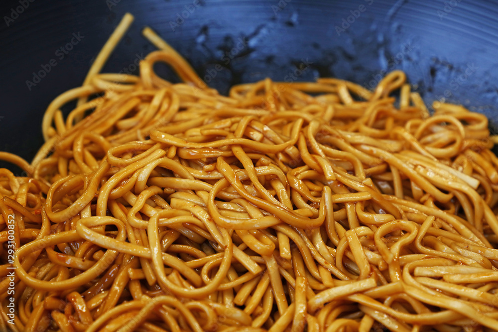 Close up Asian fried noodles in wok pan Close up Asian fried noodles in wok pan