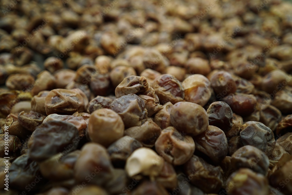 Dried date fruit rotates, background dates, close up. Food background. Organic food. Sunlights on many dates types . summer fruit Dried date fruit rotates, background dates, close up. Food background. Organic food. Sunlights on many dates types . summer fruit