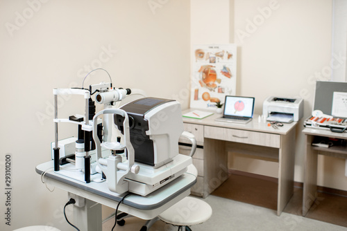 Ophthalmological office with diagnostic equipment and doctors working place at the ophthalmic clinic