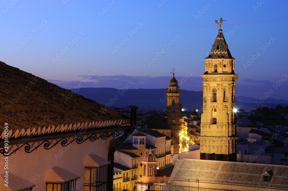 San Sebastian (nearest) and San Augustin church towers at dusk, Antequera, Spain. San Sebastian (nearest) and San Augustin church towers at dusk, Antequera, Spain.