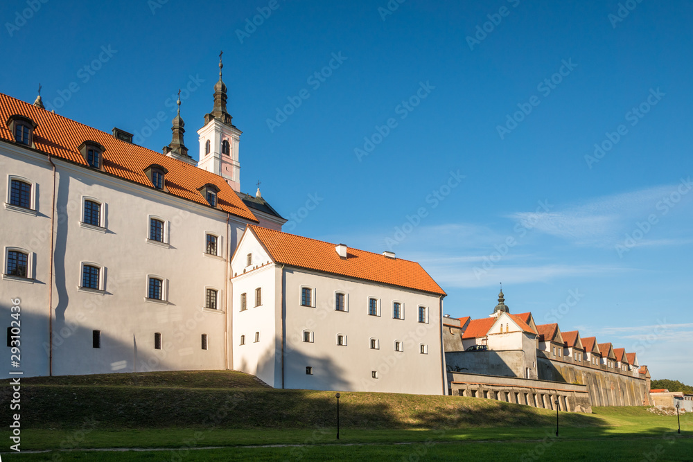 Church and monastery in Wigry on a sunny day, Podlaskie, Poland Church and monastery in Wigry on a sunny day, Podlaskie, Poland