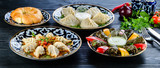 Set of dishes of Uzbek cuisine , Manty, plov, dolma and lagman