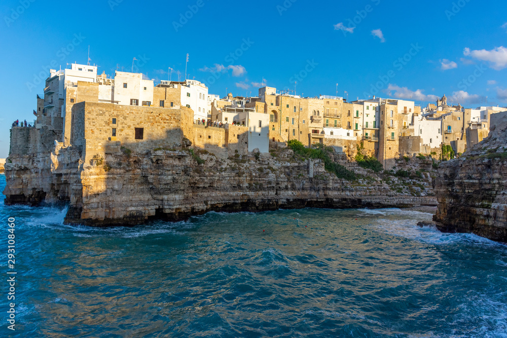 Italy, Polignano a mare, view of the houses overlooking the sea