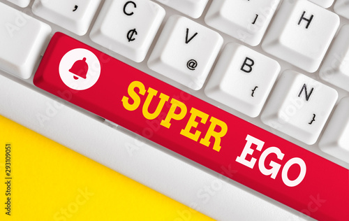 Text sign showing Super Ego. Business photo showcasing The I or self of any demonstrating that is empowering his whole soul White pc keyboard with empty note paper above white background key copy photo