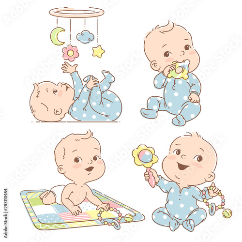 Set with baby boy playing toys. First year games.