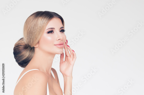 Pretty woman with perfect hairstyle on white background