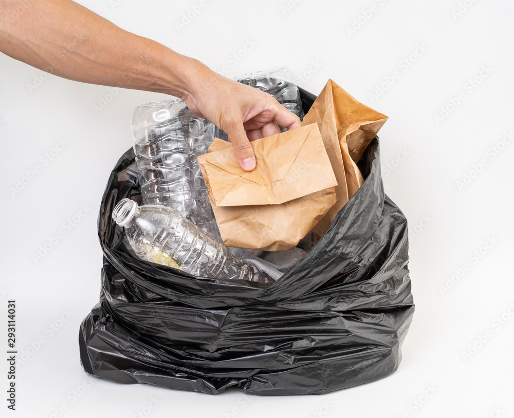 Trash bag with recycle garbage on white background