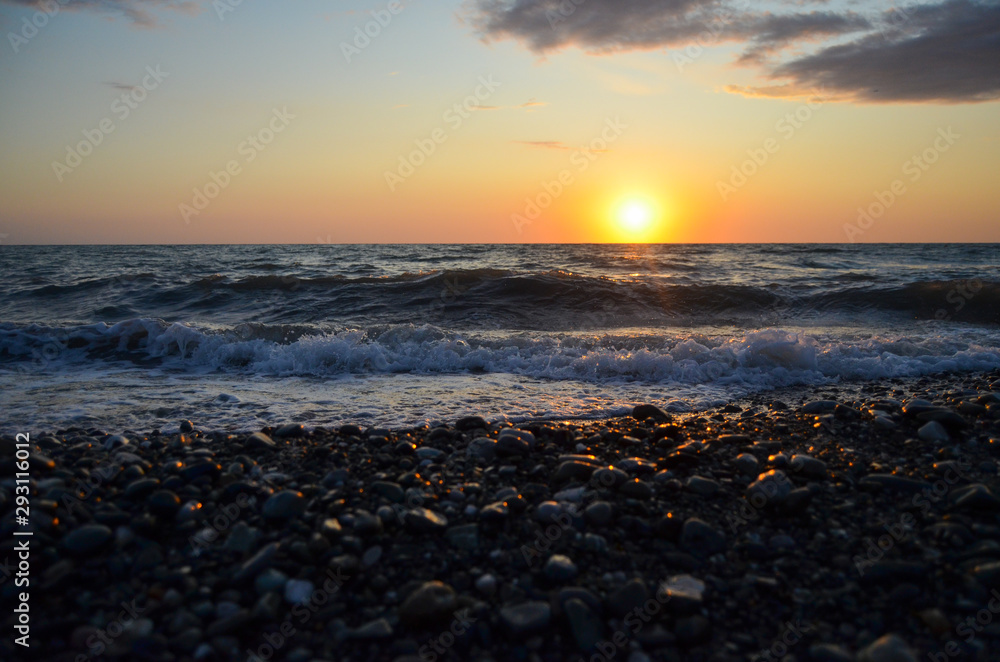 Waves of the Black sea during sunset