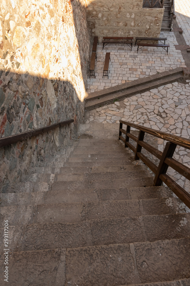 Fragment of a stone staircase leading to a closed courtyard on t Fragment of a stone staircase leading to a closed courtyard on t