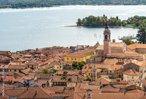 Fototapeta Naklejka Na Ścianę i Meble -  Top view of Arona city situated on shore of lake Maggiore in Piedmont, Italy