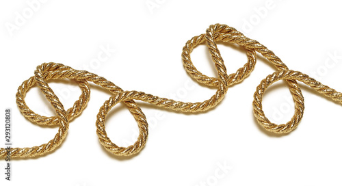 Golden rope with light shadow over white background