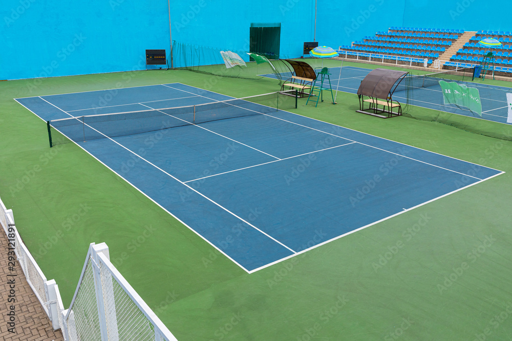 Diagonal view of tennis court in tennis training centre.