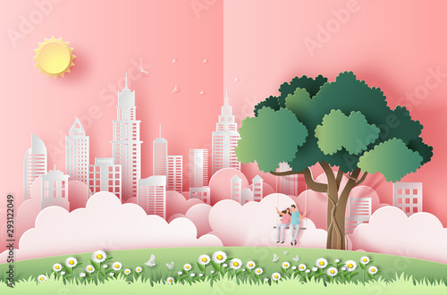 Cute couple sitting on a swing under a tree in a big city, pop up card, paper art style, flat-style vector illustration.