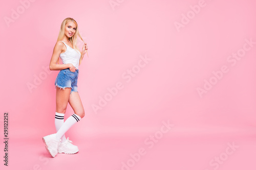 Full length profile photo of pretty lady with perfect shapes cool look wear casual trendy outfit isolated pink color background