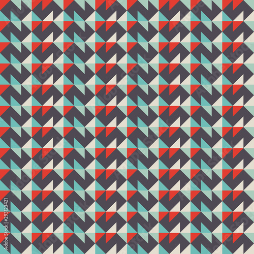 Vector abstract seamless pattern with triangles of different colors. Textile background for package, cover, greeting cards.
