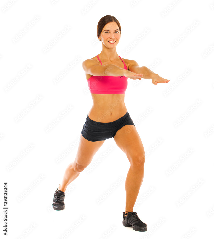 Young fitness brunette woman in red top and black shorts Young fitness brunette woman in red top and black shorts