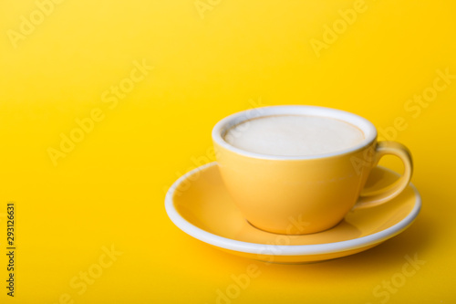 yellow cup on a yellow background