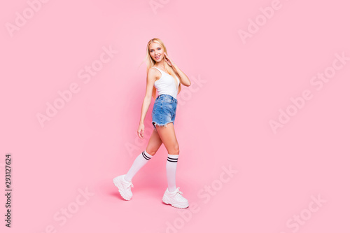 Full size photo of content satisfied youth girl walk have free time wear good-looking modern outfit isolated over pastel color background