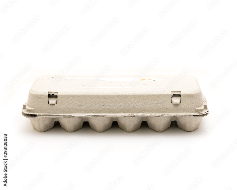 Studio shot one dozen egg box isolated on white Studio shot one dozen egg box isolated on white