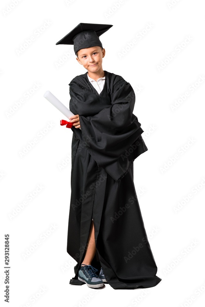 Full body of Little boy graduating keeping arms crossed on isolated white background Full body of Little boy graduating keeping arms crossed on isolated white background