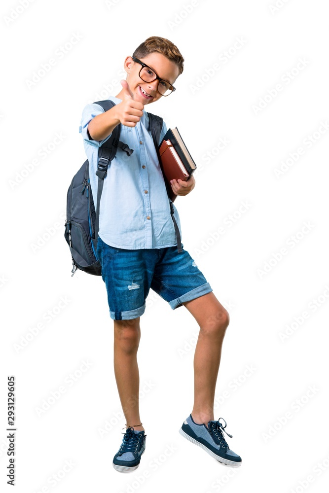Full body of Student boy with backpack and glasses giving a thumbs up gesture and smiling on isolated white background Full body of Student boy with backpack and glasses giving a thumbs up gesture and smiling on isolated white background