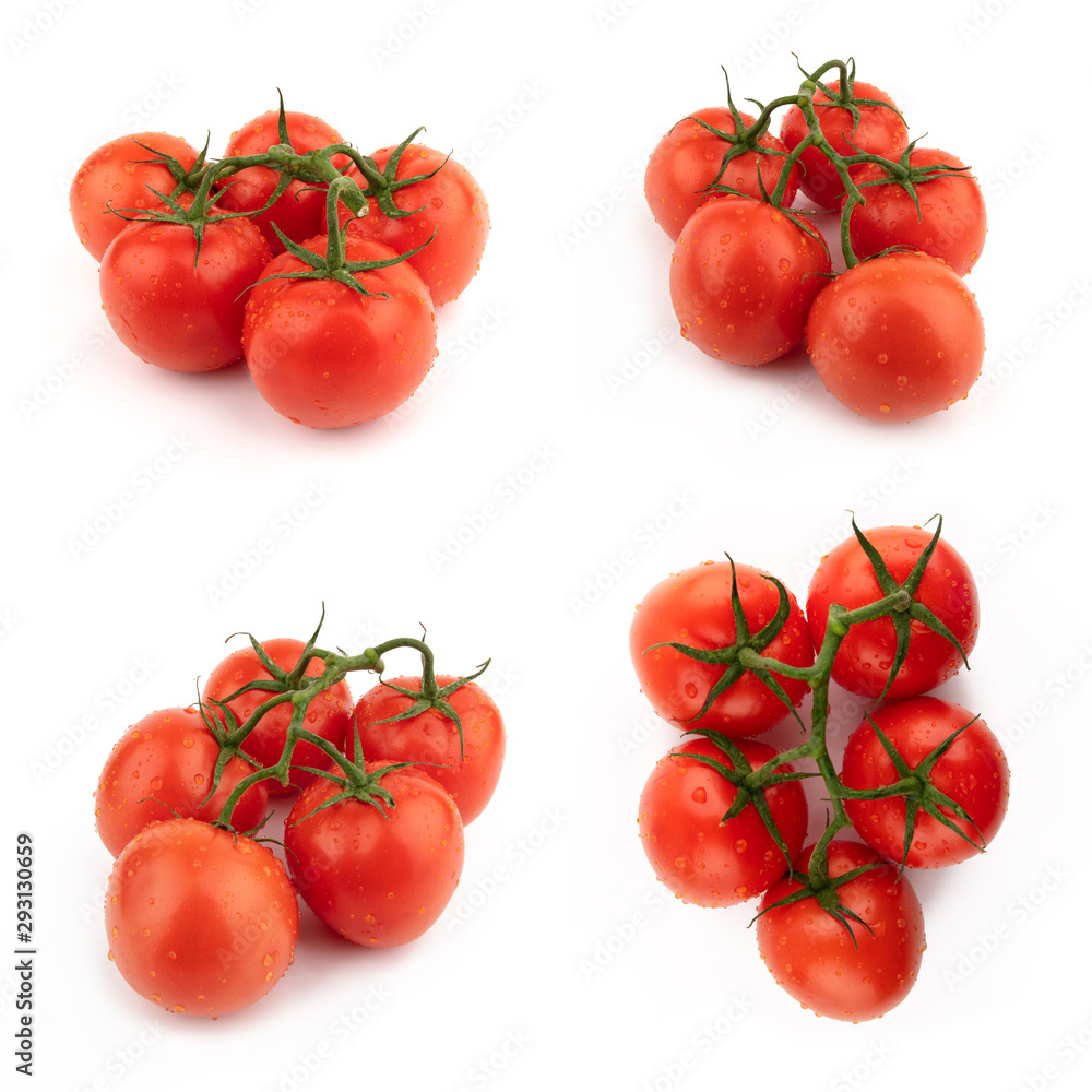 Red tomatoes whole set on a green branch. Isolated on a white background. Red tomatoes whole set on a green branch. Isolated on a white background.
