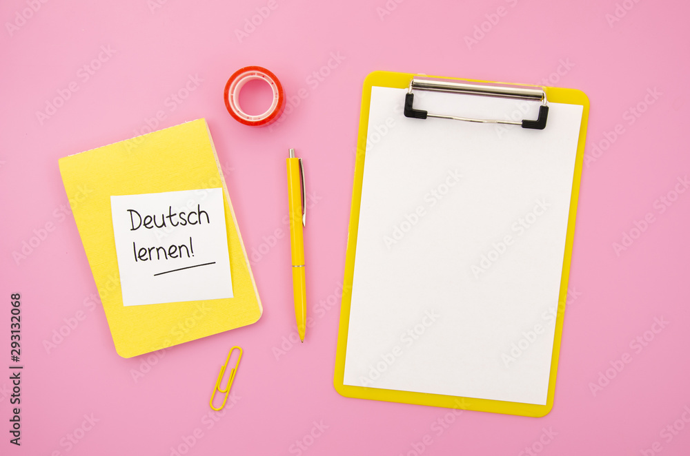 Learning a new language objects on pink background Learning a new language objects on pink background