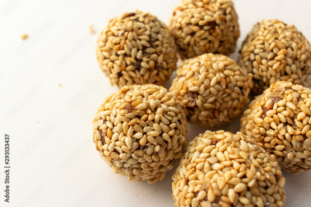 Healthy homemade cookie with nuts and sesame on white background Healthy homemade cookie with nuts and sesame on white background
