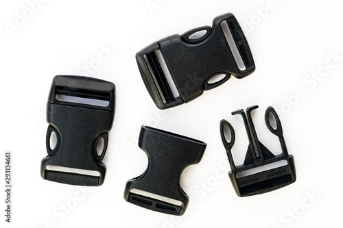 Black plastic fastener - fastex for the manufacture of backpacks. Reinforced plastic carbine for military and camping ammunition.