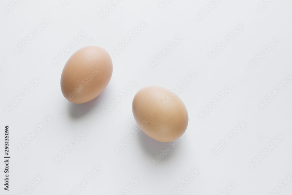 Chicken eggs in cardboard package on white background Chicken eggs in cardboard package on white background