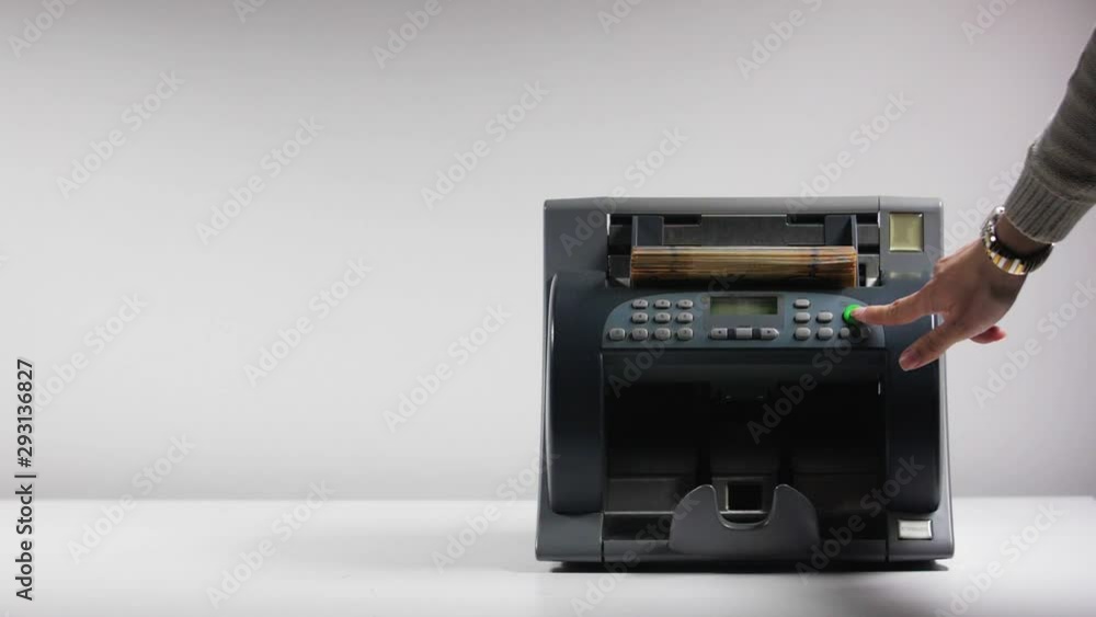 woman starts counting machine with bitcoin bills slow motion woman starts counting machine with bitcoin bills slow motion