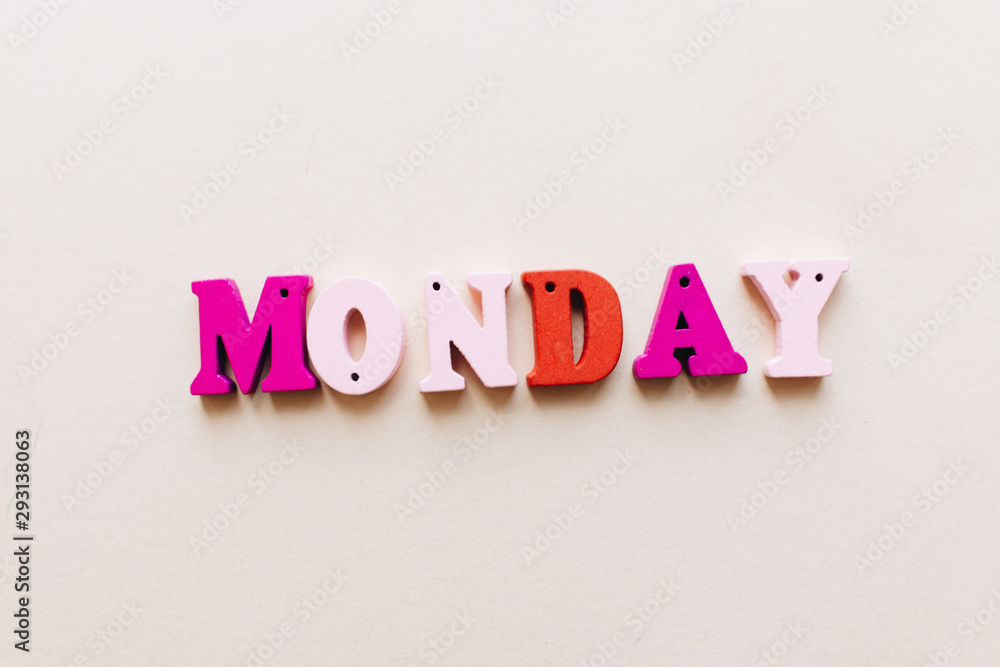 Colorful wooden letters, MONDAY lettering Colorful wooden letters, MONDAY lettering