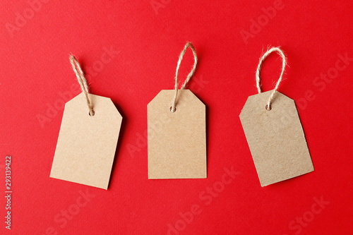 Cardboard tags with space for text on red background