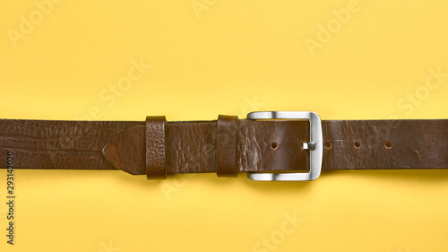 leather belt on a yellow background