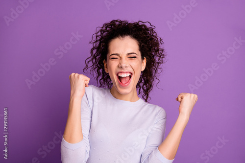 Close up photo of amazing wavy lady win competition yelling raising fists celebrating wear casual pullover isolated purple color background