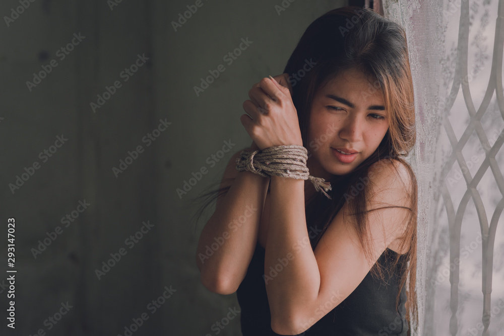 Naklejka premium Women violence. Abused and tortured concept. Human trafficking concept. Stop violence against Women. International women's Day. Stop abusing