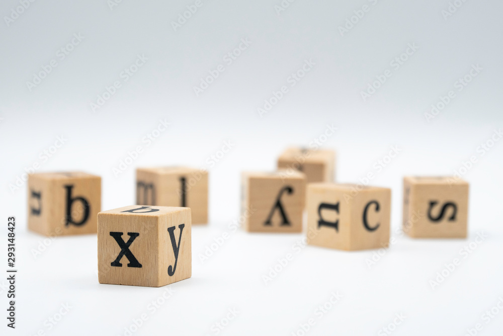 Wooden alphabet blocks isolated on white background. Wooden alphabet blocks isolated on white background.