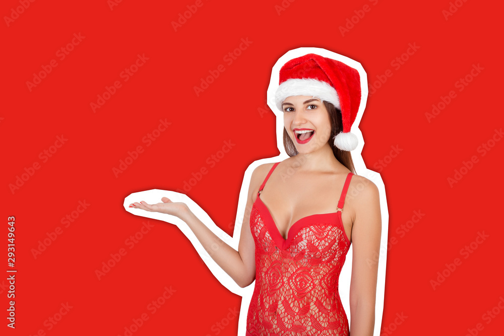 Young beautiful girl in swimsuit and christmas hat with palm up and place your product here. Recommend advertising concept. Magazine collage style with trendy color background Young beautiful girl in swimsuit and christmas hat with palm up and place your product here. Recommend advertising concept. Magazine collage style with trendy color background