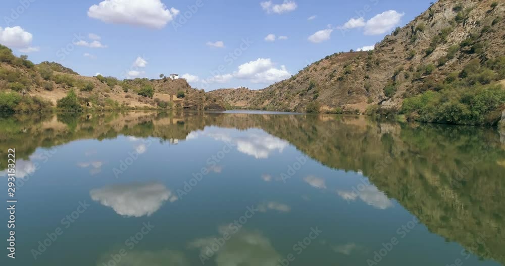 Aerial view of the Guadiana river at Azenhas (watermill) beach near town of Mertola in southeastern Portuguese Alentejo destination region. Portugal. Aerial view of the Guadiana river at Azenhas (watermill) beach near town of Mertola in southeastern Portuguese Alentejo destination region. Portugal.