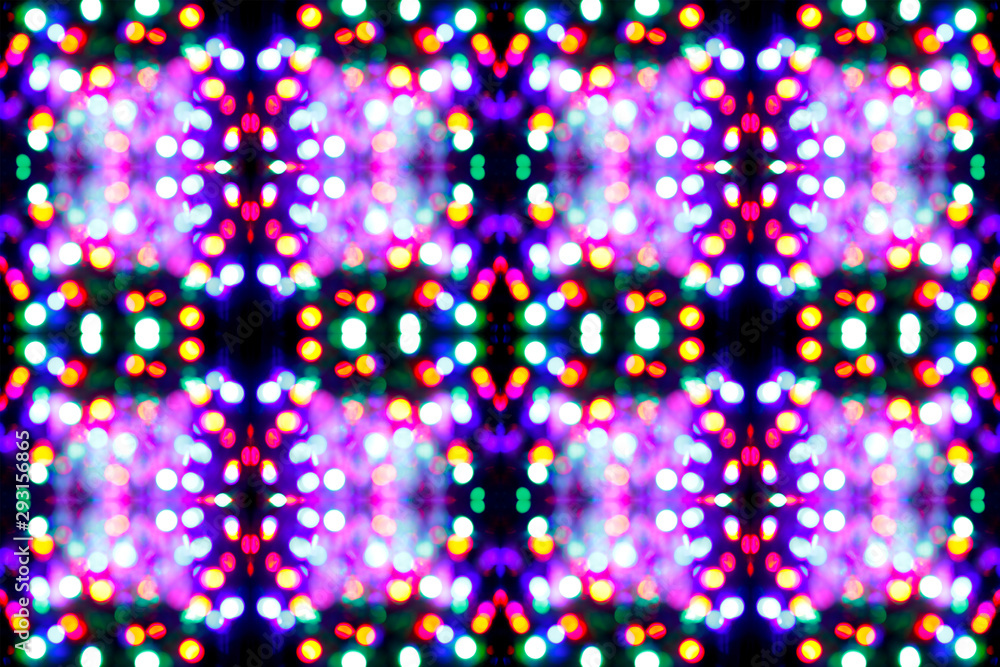 abstract background kaleidoscope of neon bokeh lights, Christmas lights in the city. Blurred garland with small lights