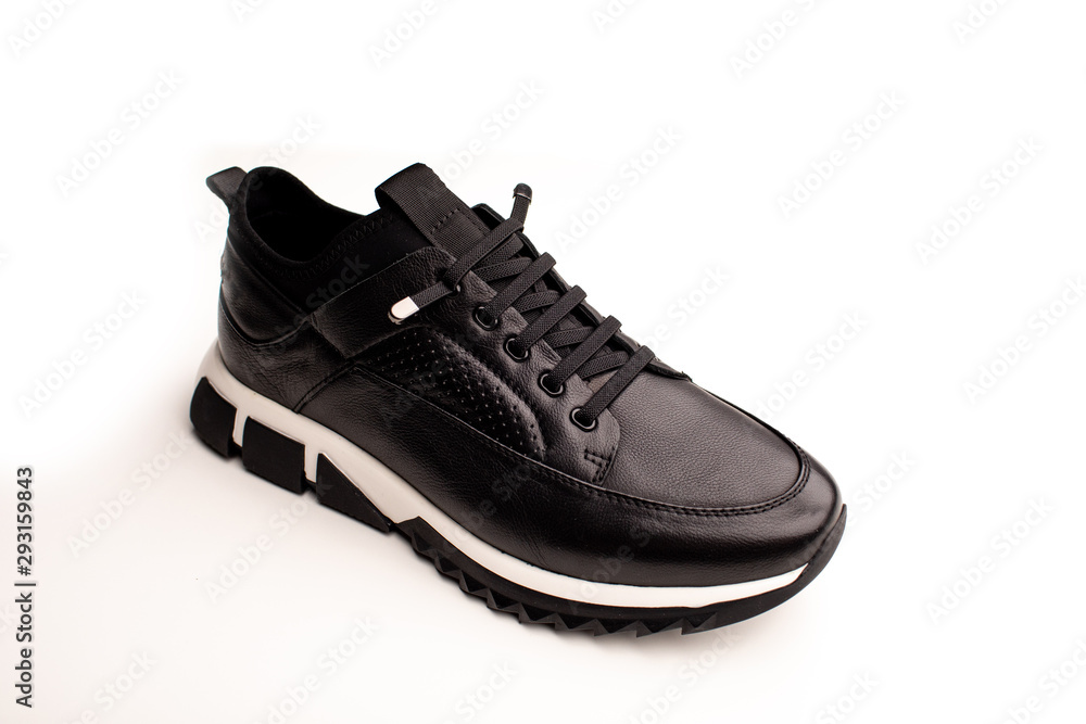 Black leather men's sneakers isolated on white background