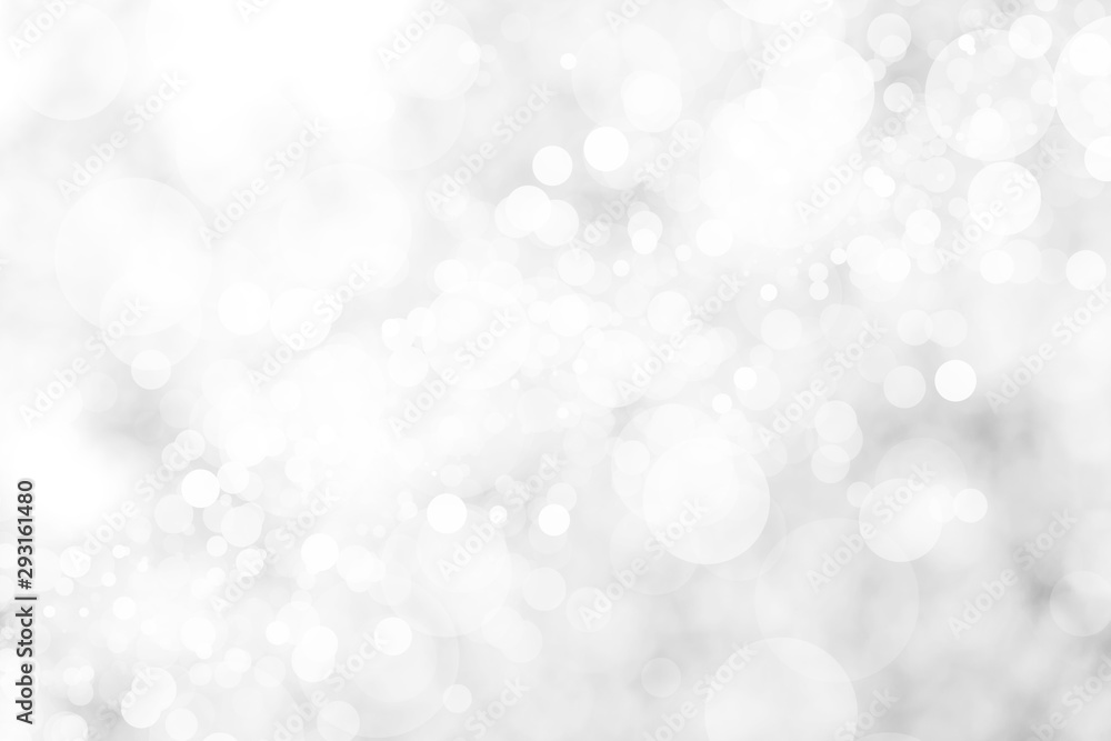 Abstract background with White bokeh on gray background. christmas blurred beautiful shiny Christmas lights. Abstract background with White bokeh on gray background. christmas blurred beautiful shiny Christmas lights.
