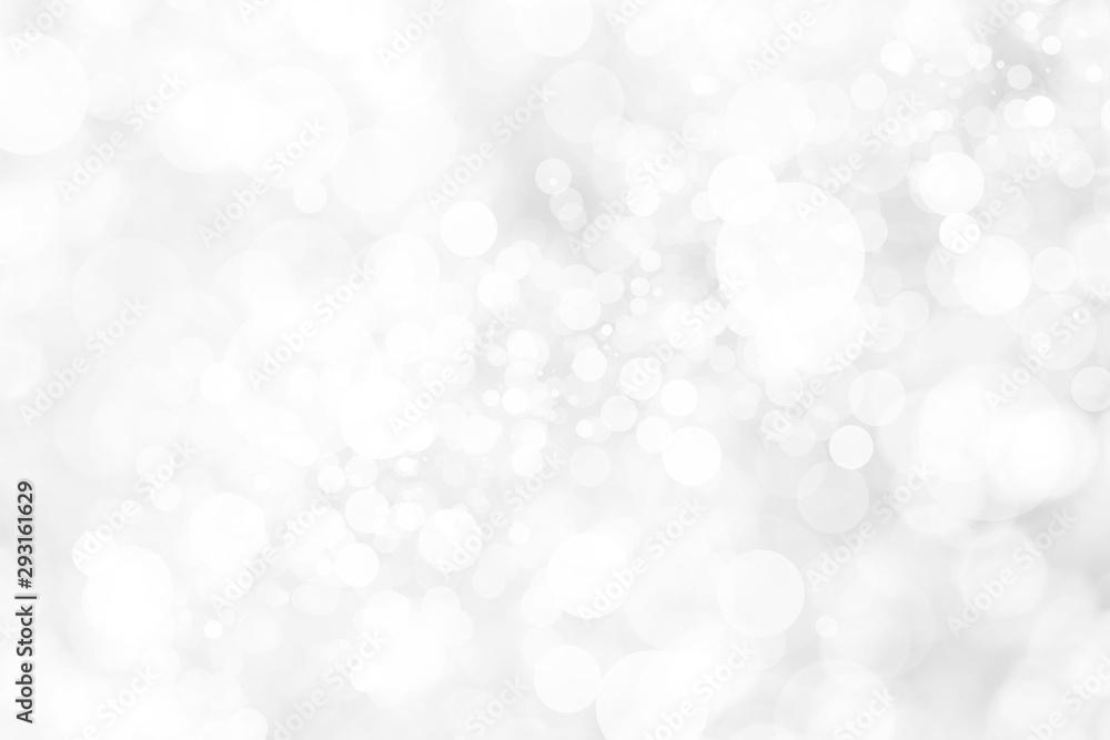 Abstract background with White bokeh on gray background. christmas blurred beautiful shiny Christmas lights. Abstract background with White bokeh on gray background. christmas blurred beautiful shiny Christmas lights.