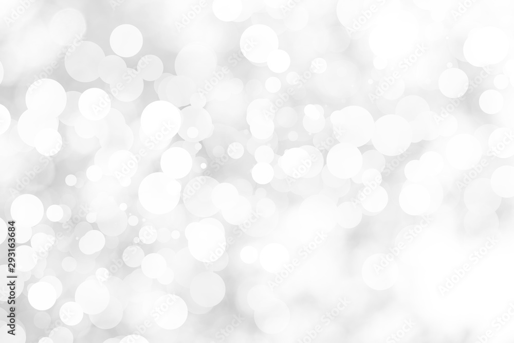 Abstract background with White bokeh on gray background. christmas blurred beautiful shiny Christmas lights. Abstract background with White bokeh on gray background. christmas blurred beautiful shiny Christmas lights.