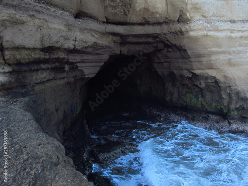 natural cave in the rocks by the sea