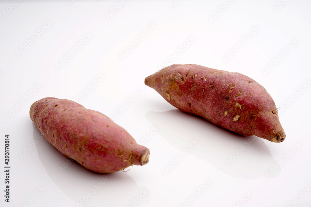 Japanese sweet potatoes on white isolated background