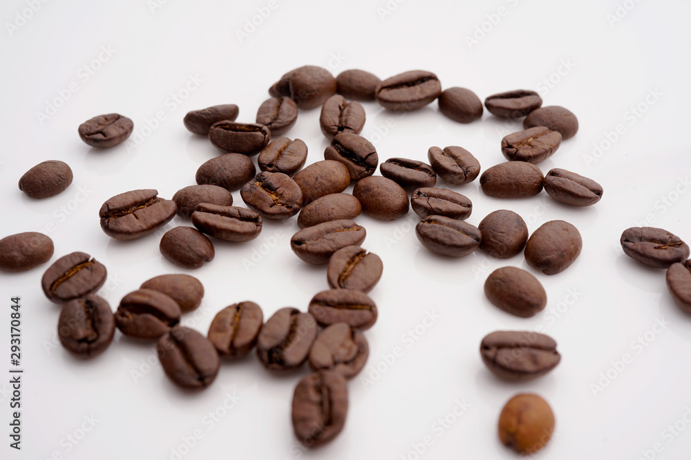Coffee beans. Distributed isolated on white background Coffee beans. Distributed isolated on white background