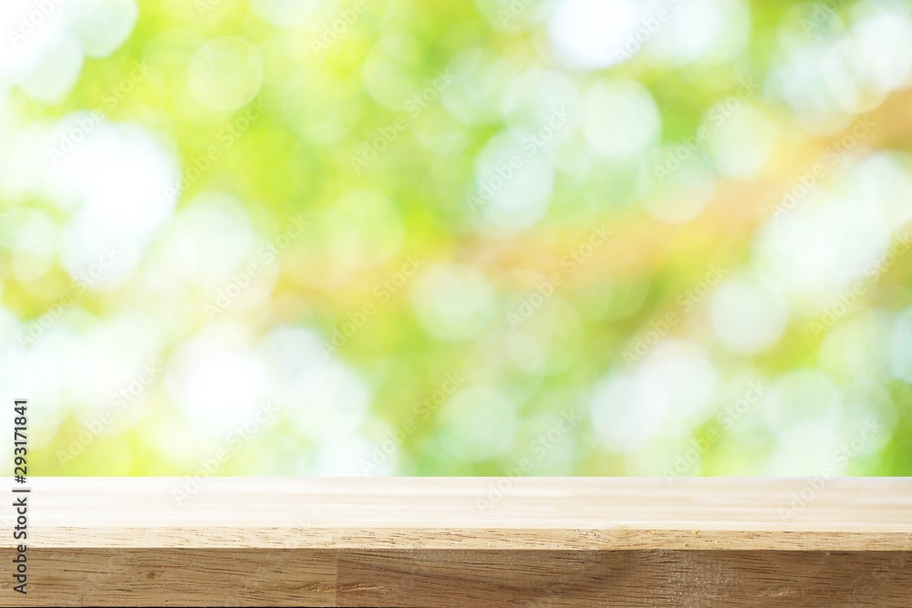 Empty white table and blurred garden bokeh background. mock up for display or montage of product, Business presentation.